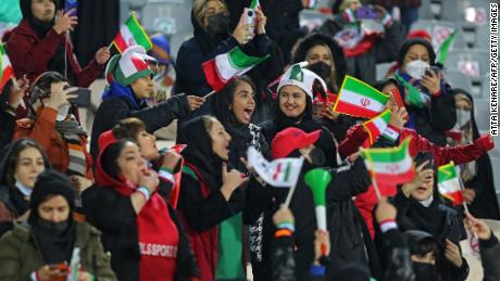 Iran supporters cheer during the 2023 Qatar World Cup Asian Qualifiers match between Iran and Iraq.