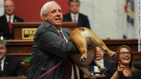 The ultimate rebuttal: West Virginia governor hoists dog's derrière in cheeky response to critics