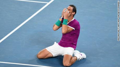 Rafael Nadal drops to his knees after winning the Australian Open.