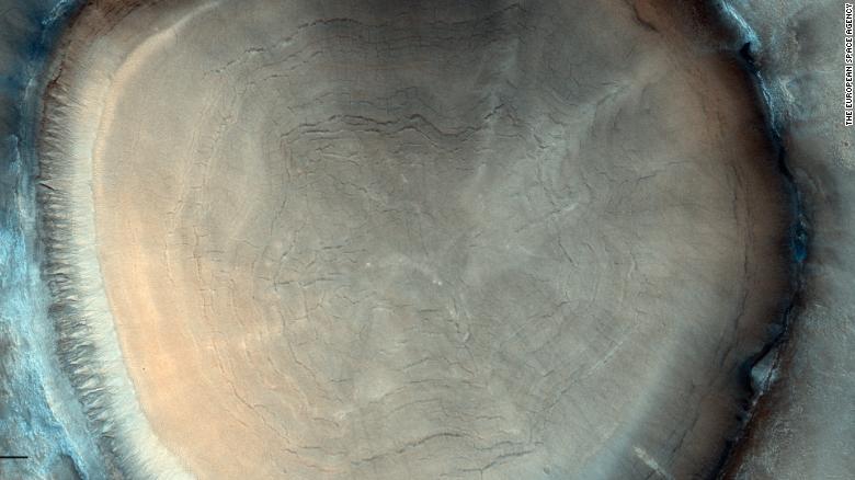 Rings in ‘tree stump’ crater found on Mars illuminate red planet’s past climate