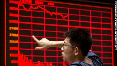 BEIJING, CHINA - AUGUST 27:  A Chinese day trader reacts as he watches a stock ticker at a local brokerage house on August 27, 2015 in Beijing, China. A dramatic sell-off in Chinese stocks caused turmoil in markets around the world, driving indexes lower and erasing trillions of dollars in value. China&#39;s government has implemented a series of top-heavy measures to manipulate a market turnaround including its fifth cut to interest rates since November. Concerns about the overall health of China&#39;s economy remain amid data showing slower growth.  (Photo by Kevin Frayer/Getty Images)