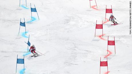 Wendy Holdener (L) of Switzerland and Hungary&#39;s Mariann Mimi Maroty compete during the Alpine Team Event at the PyeongChang 2018 Winter Games.