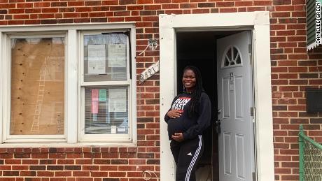 Danielle Green, in front of a house in Baltimore that she flipped last year, said that homes that make attractive flips are harder to find and higher priced than before the pandemic.
