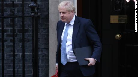 Boris Johnson leaves 10 Downing Street to make a statement in Parliament on January 31, 2022, after receiving a version of the Sue Gray report.