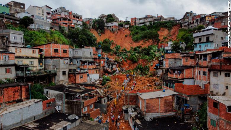 Rescuers look for survivors after deadly landslides in Brazil