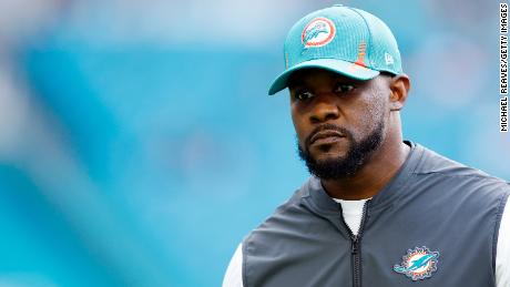 Former Miami Dolphins head coach Brian Flores claims he was offered money to keep quiet after firing