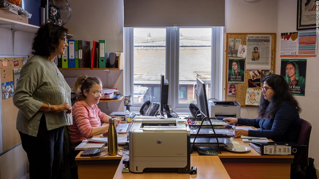 Rahila Gupta, left, with colleagues at the Southall Black Sisters offices in west London.