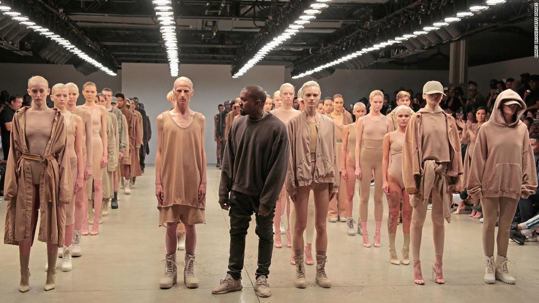 West appears at a Yeezy fashion show in New York in 2015. He released his first Yeezy sneakers that year.