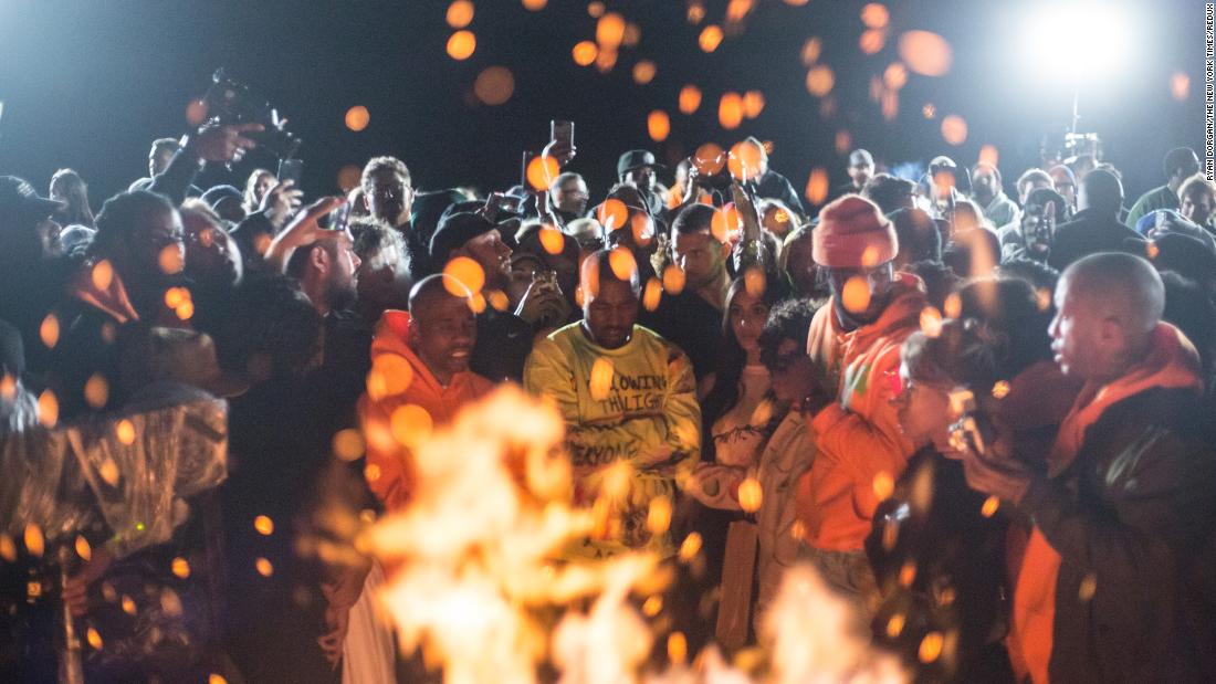 West is surrounded by friends and fans at an album-listening party in Moran, Wyoming, in 2018.