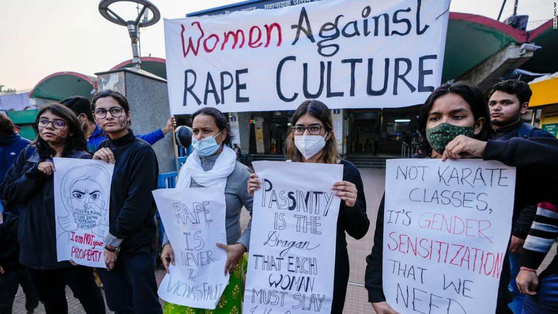 University students in Kolkata stage a rally in support of a 20-year-old woman attacked in New Delhi.