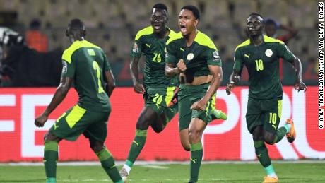 Senegal players celebrate after Abdou Diallo opened the scoring.