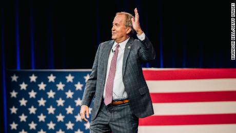 In this July 11, 2021, file photo, Texas Attorney General Ken Paxton waves after speaking during the Conservative Political Action Conference in Dallas. 