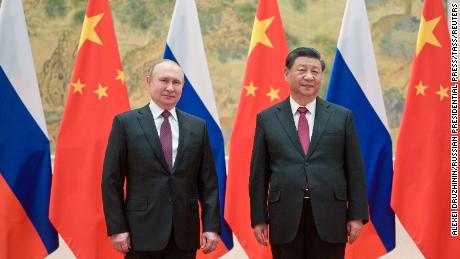 Russia&#39;s President Vladimir Putin and his Chinese counterpart Xi Jinping pose during a meeting in Beijing on Friday.