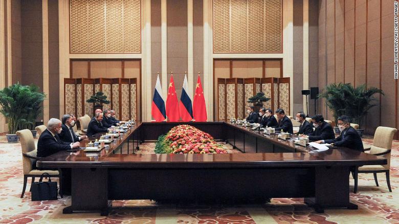 Russia&#39;s President Vladimir Putin, fourth left, and his Chinese counterpart Xi Jinping, fourth right, hold bilateral talks at the Diaoyutai State Guesthouse in Beijing on Friday.