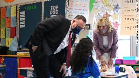 First Lady Jill Biden and Education Minister Miguel Cardona talk to a student during a field trip to Benjamin Franklin Elementary School in Meriden, Connecticut, March 3, 2021. 