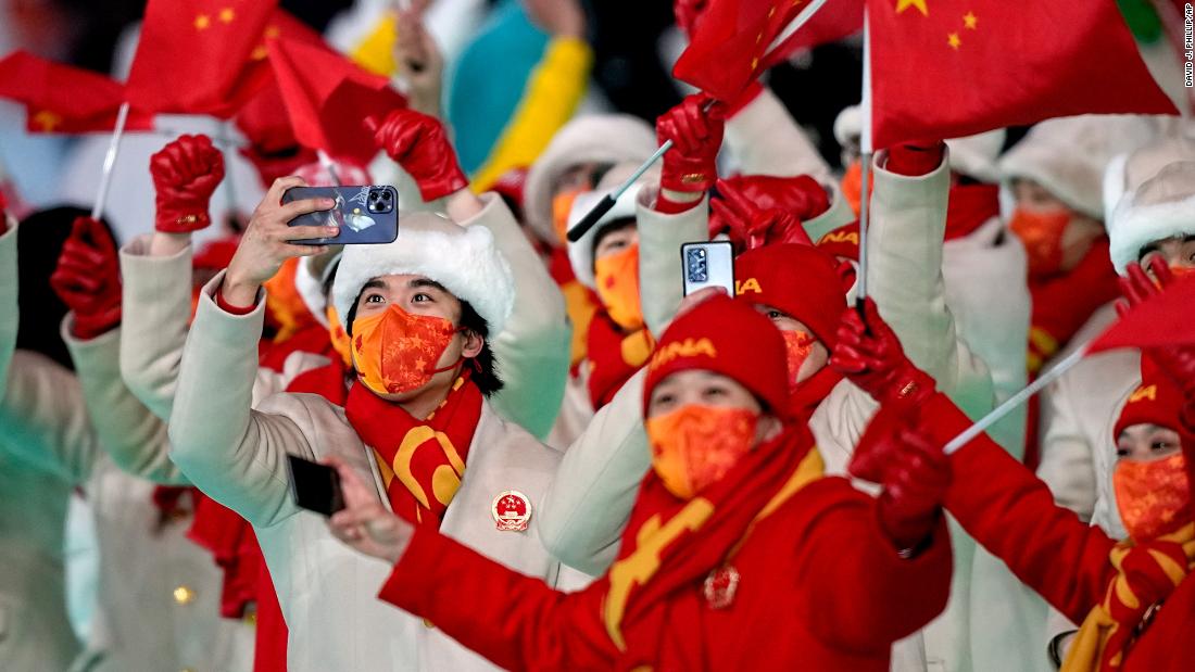 China&#39;s team enters the stadium during the opening ceremony&#39;s parade of nations.
