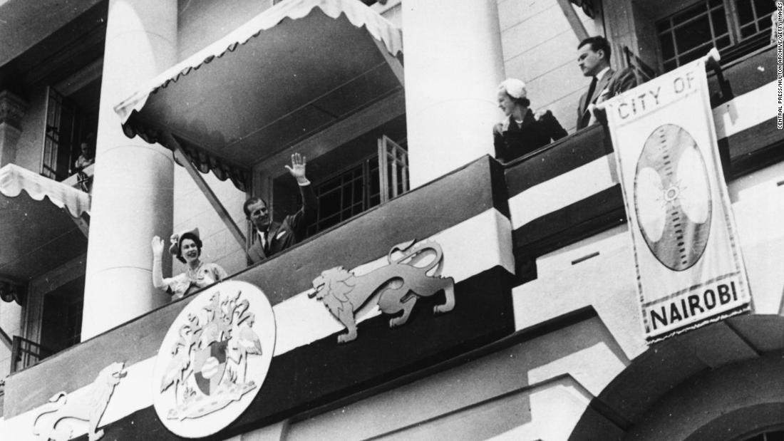 Princess Elizabeth and Prince Philip wave to Kenyans from the balcony of Nairobi&#39;s City Hall on February 4, 1952. 