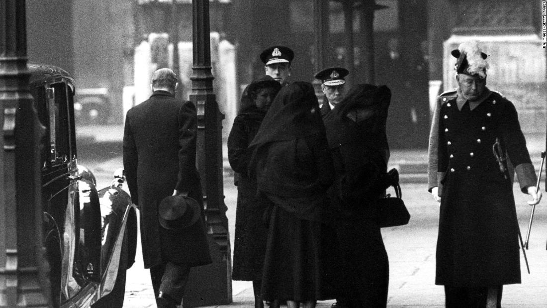 The Queen and her family arrives for her father&#39;s funeral procession on February 15, 1952.