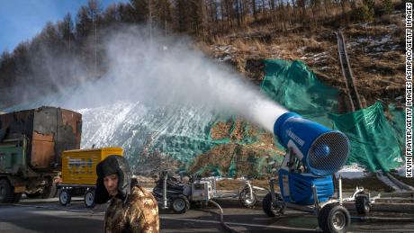 Artificial snow machines go to work in January outside one of the athletes villages in Zhangjiakou.