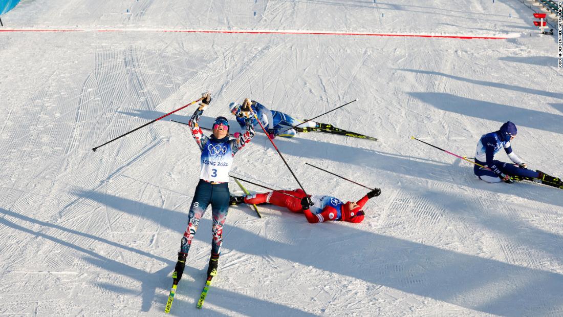 Norway&#39;s Therese Johaug celebrates after crossing the finish line to win the women&#39;s skiathlon on February 5. It was the first medal event of these Olympics.