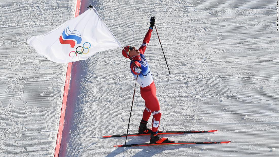 Russian Alexander Bolshunov celebrates after &lt;a href=&quot;https://www.cnn.com/world/live-news/beijing-winter-olympics-02-06-22-spt/h_1993a8651ad6f621e1b05e2848c9ae1e&quot; target=&quot;_blank&quot;&gt;winning the gold medal in the skiathlon&lt;/a&gt; on February 6.