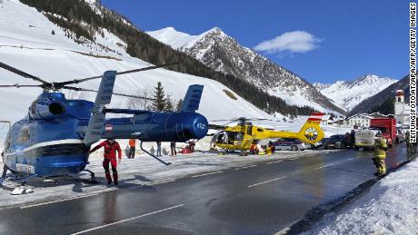 Rescue helicopters stand on a street near the Gammerspitze after an avalanche killed one person on February 4, 2022. 