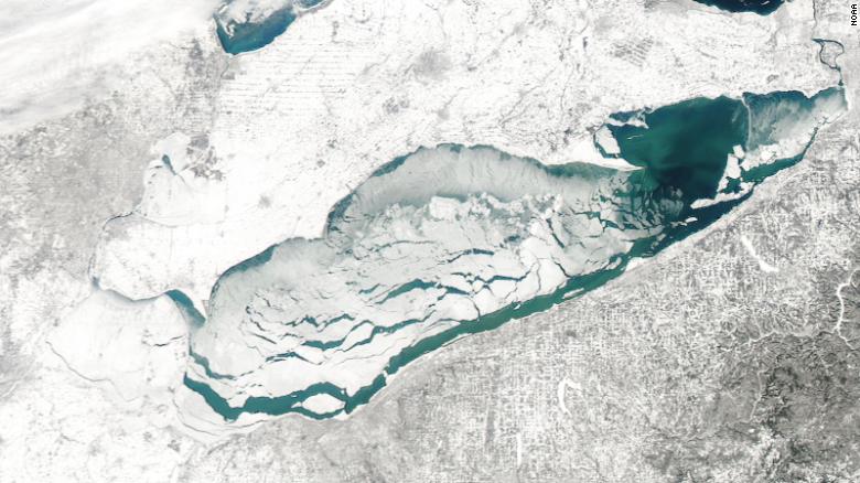 US Coast Guard working to rescue 20 people trapped on floating ice on Lake Erie