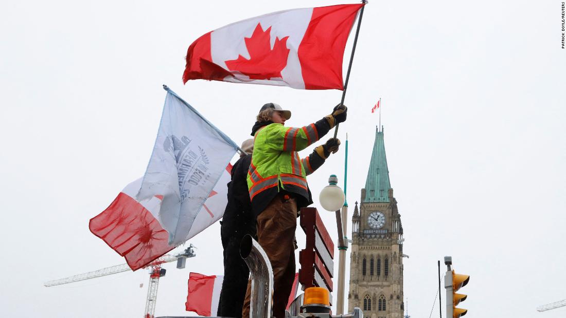 Crippling protests across Canada over Covid-19 restrictions enter second week as officials announce multiple arrests