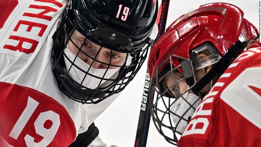Canadian hockey player Brianne Jenner, left, faces off against the Russian Olympic Committee&#39;s Oxana Bratishcheva during a preliminary round game on February 7. The game was delayed for an hour after the ROC&#39;s Covid-19 test results had not arrived on time. When the teams finally played, &lt;a href=&quot;https://www.cnn.com/world/live-news/beijing-winter-olympics-02-07-22-spt/h_c00ab11cc129521b0e6f6f86644487b4&quot; target=&quot;_blank&quot;&gt;they wore masks under their cages.&lt;/a&gt;