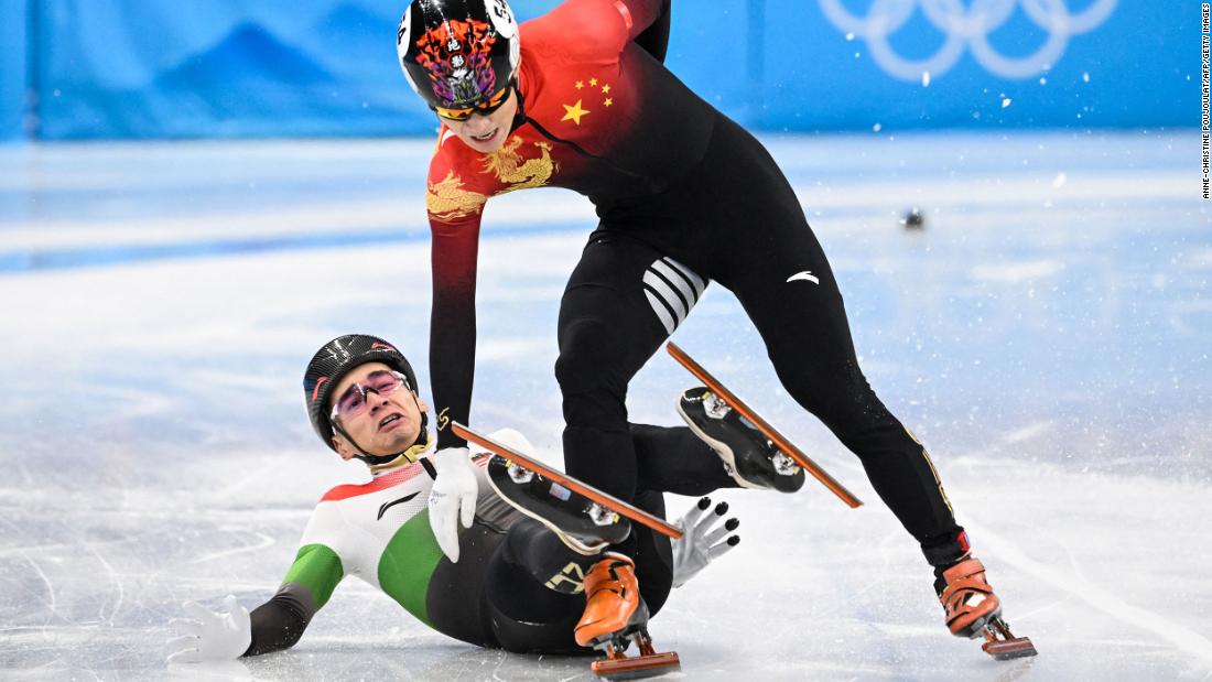 From left, Hungary&#39;s Shaolin Sándor Liu gets tangled up with China&#39;s Ren Ziwei after crossing the finish line in the 1,000-meter short track final on February 7. Liu crossed the finish line first, but &lt;a href=&quot;https://www.cnn.com/world/live-news/beijing-winter-olympics-02-07-22-spt/h_45a9864b48e80e22a0b20b7378fcf05b&quot; target=&quot;_blank&quot;&gt;Ren was awarded the gold medal&lt;/a&gt; after Liu was given a yellow card and two penalties for illegally changing lanes and causing contact with Ren.