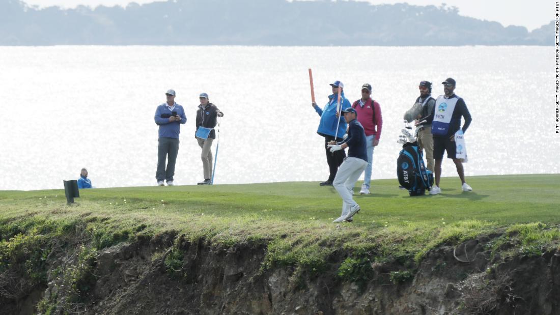Spieth salvaged a par from the hole, with his cliff shot landing just over the green.