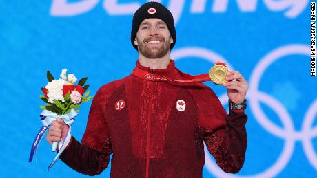 Gold medalist Max Parrot celebrates with his medal during the men&#39;s snowboarding slopestyle medal ceremony at Medal Plaza on February 7, 2022.