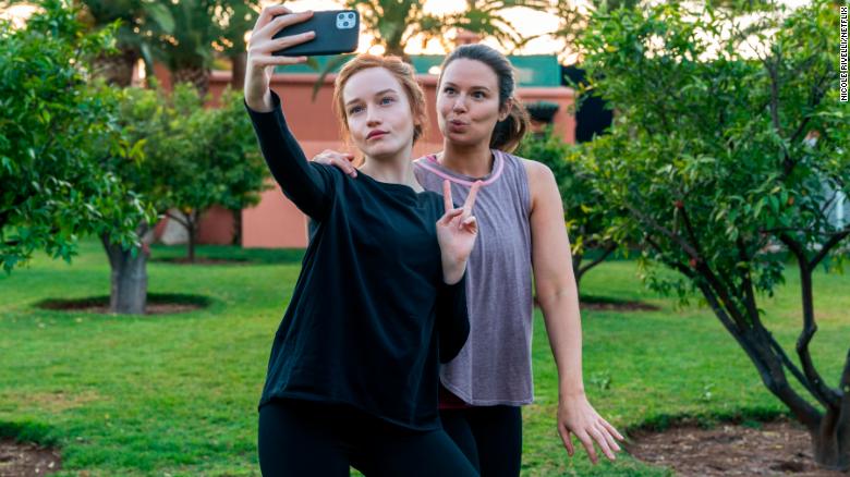 (From left) Julia Garner as Anna Delvey and Katie Lowes as Rachel in &quot;Inventing Anna.&quot;