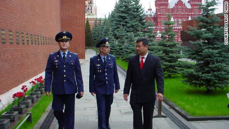 Leroy Chiao (right) attends a Red Square Memorial Ceremony with Salizhan Sharipov and Yuri Shargin, in September 2004. 