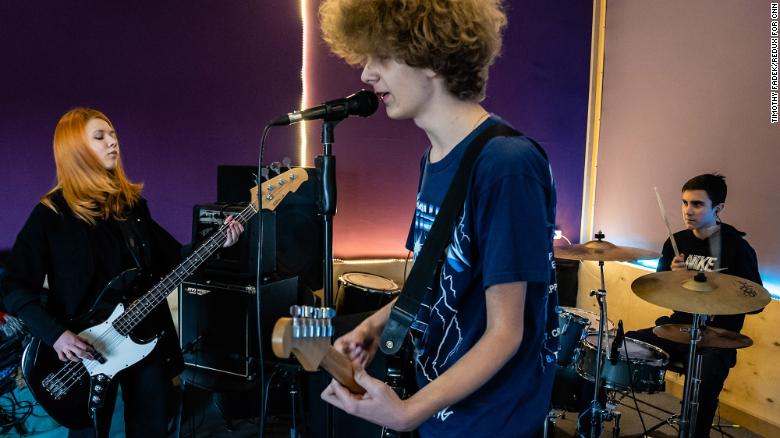 In the Ukrainian town of Avdiivka, near the front lines, life goes on for teenage rock band Metamorphoza. Maksym, 14, is the drummer. Valeria, 15, is on bass guitar, and Vadim, 15, plays lead guitar and is the main songwriter. All are from Avdiivka, and they have been playing together for two years. &quot;Sometimes we can hear the shelling at night, but we try to block it out,&quot; Maksym said. Valeria added, &quot;We are used to it.&quot;