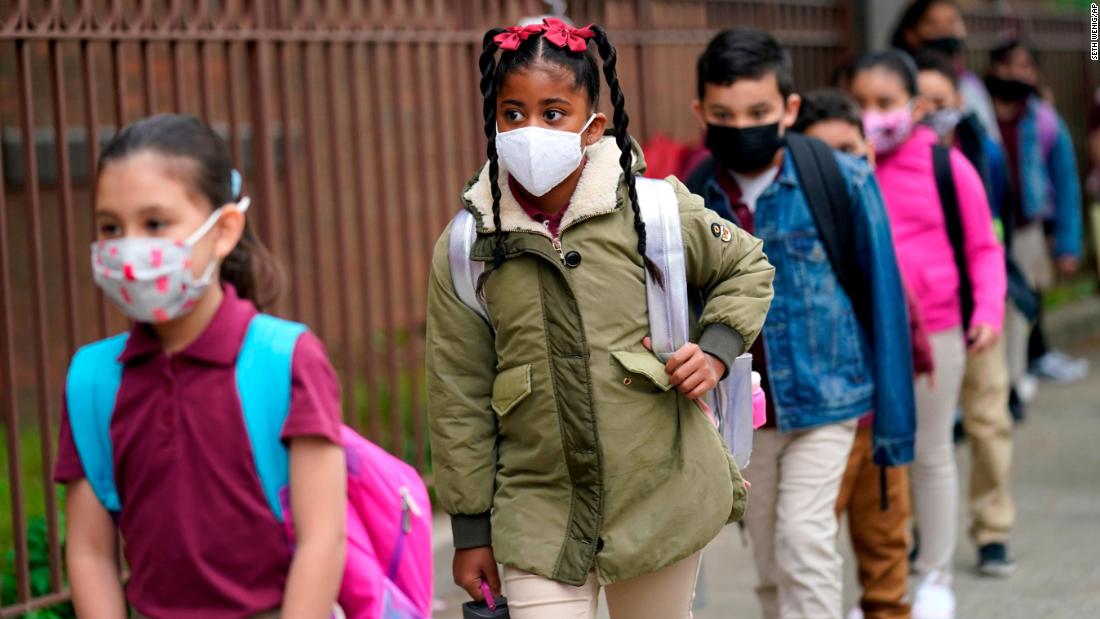 As states plan to lift school mask mandates, CDC remains vague on updating its guidance