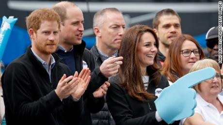 Prince Harry, Prince William and Catherine cheer on runners at the 2017 Virgin Money London Marathon, England.
