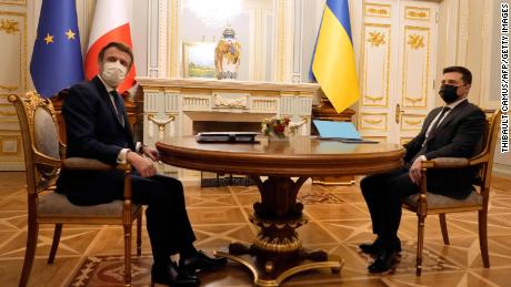 Russia pours cold water on Ukraine crisis de-escalation, as Macron meets with Zelensky