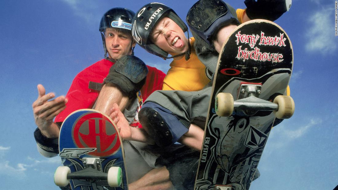 White poses with skateboarding icon Tony Hawk in 2001. White has also competed in skateboarding during his career, winning five medals at the X Games.