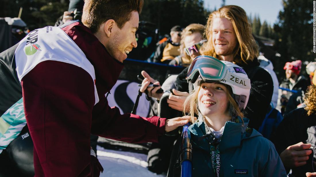 White greets a fan after his final halfpipe run in a Dew Tour event in 2021.