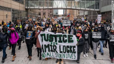 A racial justice march for Amir Locke moves through downtown Minneapolis on February 5, 2022.