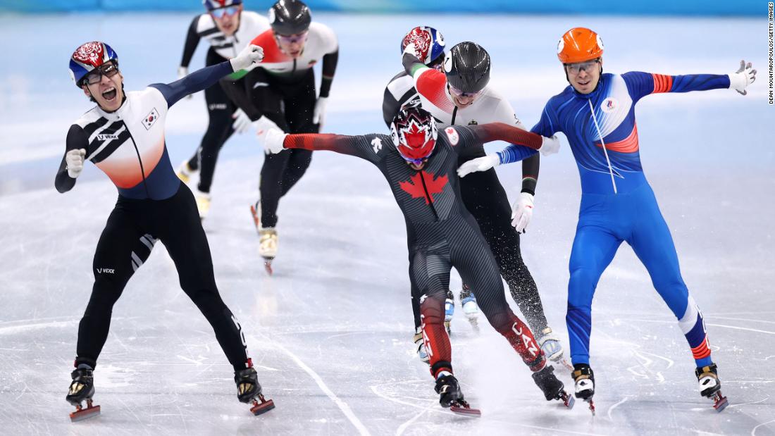 South Korea&#39;s Hwang Dae-heon, left, crosses the finish line ahead of Canadian Steven Dubois and Russian Semen Elistratov &lt;a href=&quot;https://www.cnn.com/world/live-news/beijing-winter-olympics-02-09-22-spt/h_acd23d097451444f2b42b773063e413f&quot; target=&quot;_blank&quot;&gt;to win the 1,500-meter short track final&lt;/a&gt; on February 9.