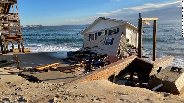 A home collapsed into the ocean as rising seas eat away at the North Carolina coast