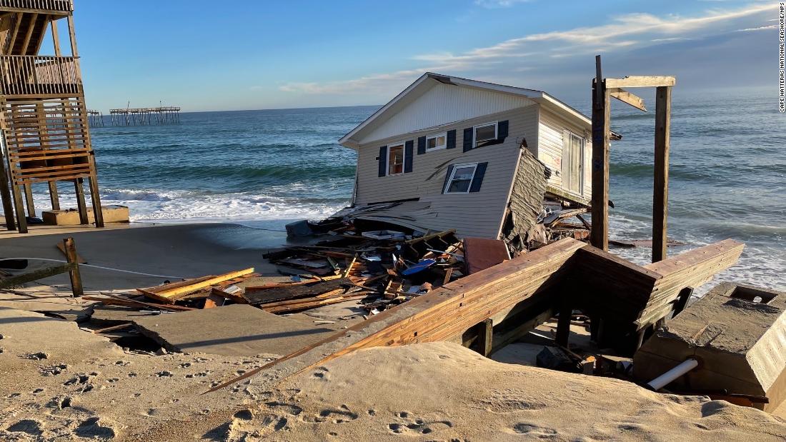 A home collapsed into the ocean as rising seas eat away at the North Carolina coast