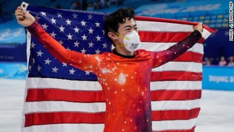 Nathan Chen celebrates after winning the gold medal in the men&#39;s free skate program.