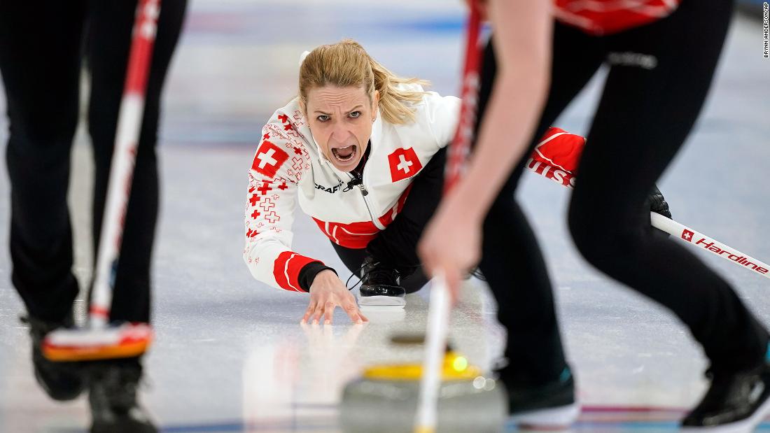 Switzerland&#39;s Silvana Tirinzoni yells to her sweepers during a curling match against Great Britain on February 10.