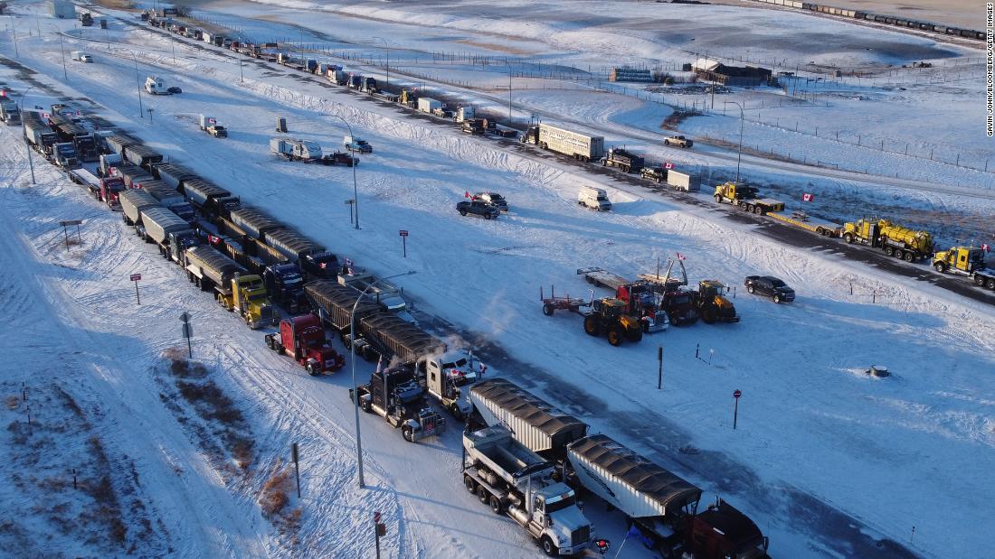 Lines of trucks block the US-Canada border during a demonstration in Coutts, Alberta, on February 2.