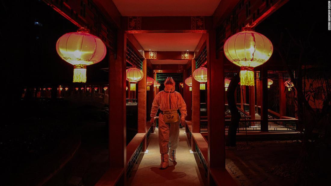 A worker in a hazmat suit walks through a hotel restaurant in Beijing on February 10. The restaurant is part of what authorities have called a &lt;a href=&quot;https://www.cnn.com/2022/01/21/china/beijing-winter-olympics-covid-quarantine-explained-mic-intl-hnk/index.html&quot; target=&quot;_blank&quot;&gt;&quot;closed loop&quot; system&lt;/a&gt; — a bubble completely cut off from the rest of the city.