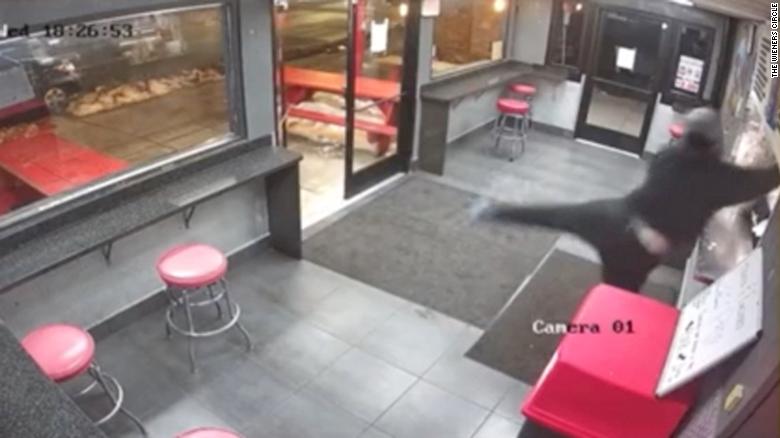 A customer told to wear a mask in a Chicago hot dog restaurant threw snow at an employee and then broke a glass door