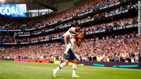 Harry Kane of Tottenham Hotspur celebrates with teammate Danny Rose after scoring his team&#39;s second goal during the Premier League match between Tottenham Hotspur and Aston Villa at Tottenham Hotspur Stadium on August 10, 2019 in London.